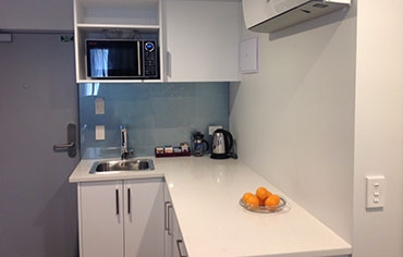 fully self-contained kitchens in all units